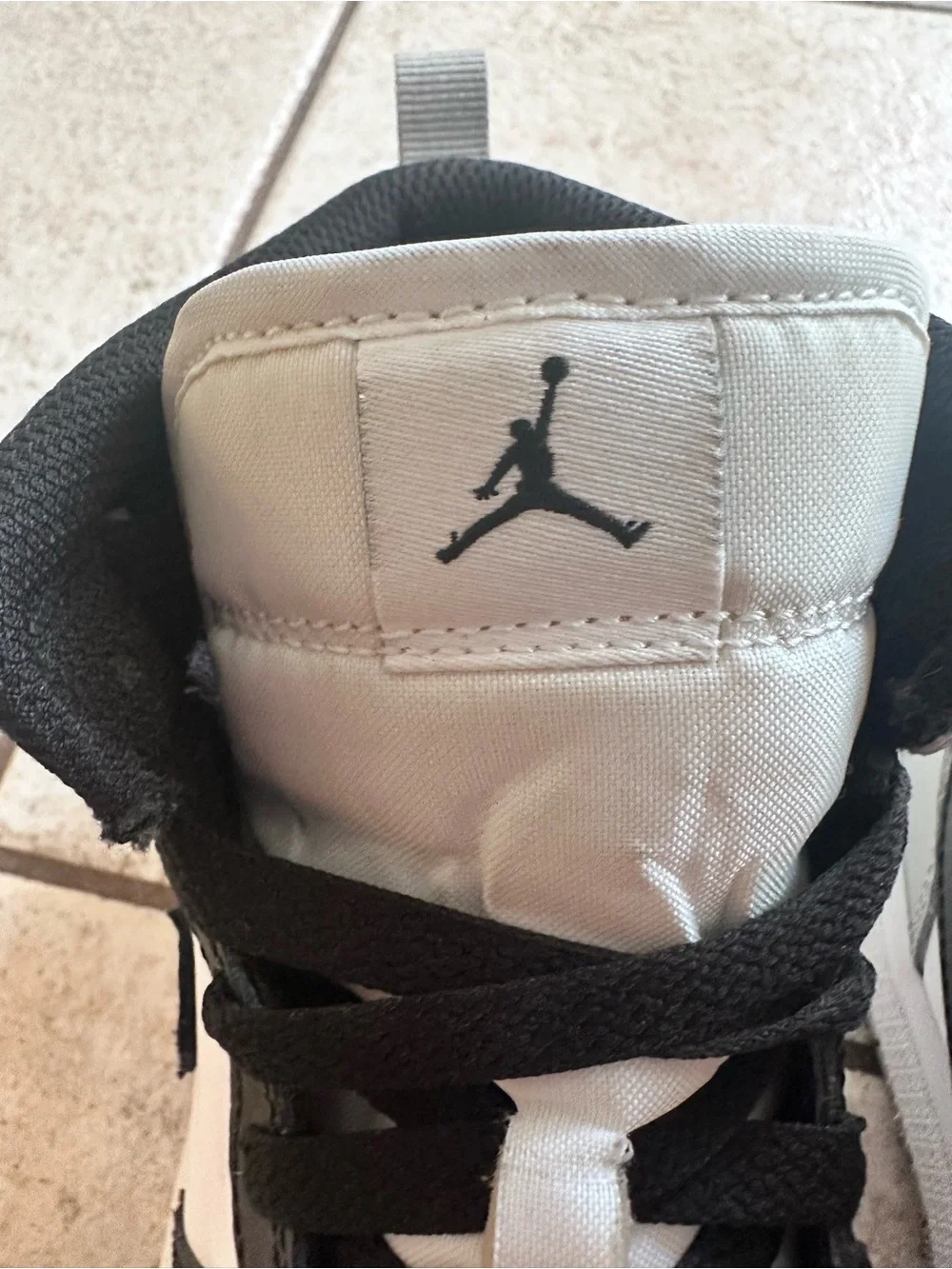 Air Jordan 1 Kids Black and White Low-Top Sneakers